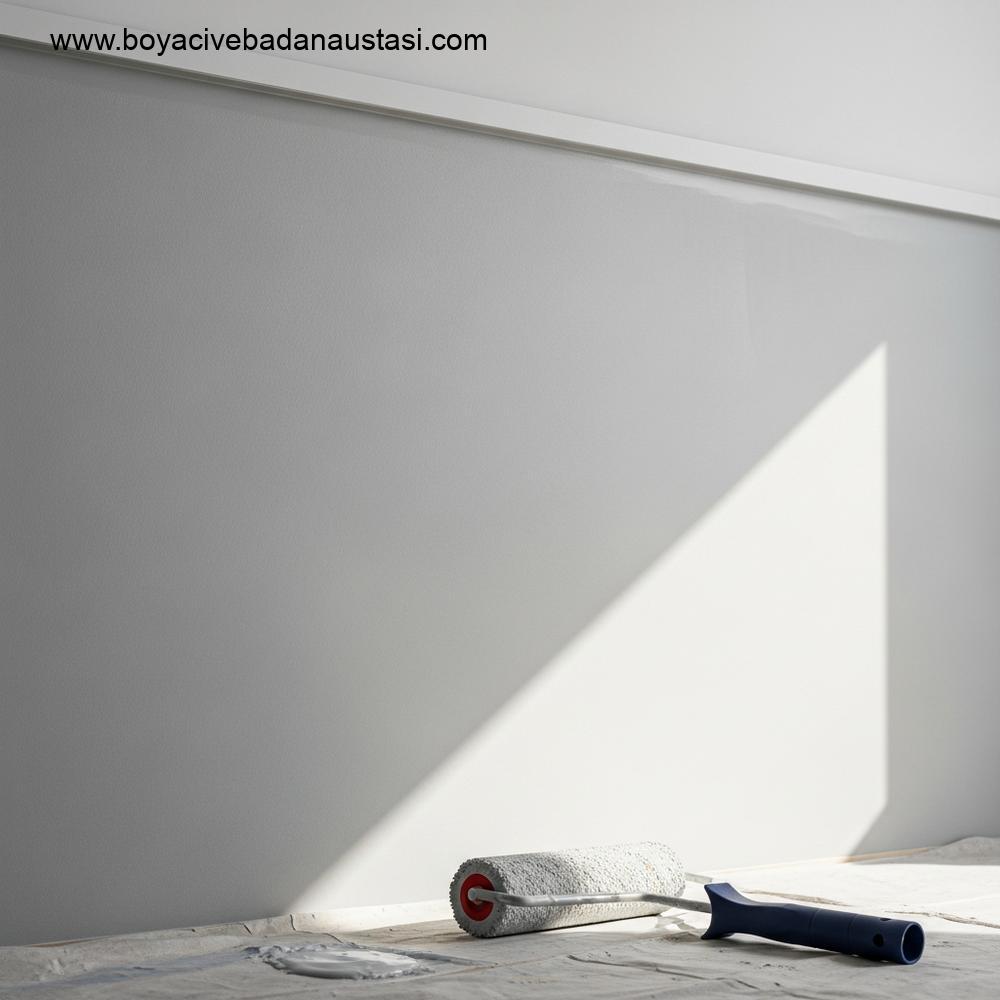 A bright, clean, and modern living room interior in İzmir style, featuring freshly painted walls in a soft, neutral color. The room has large windows overlooking a typical İzmir cityscape view (subtle suggestion of Aegean architecture in the background). Focus on the smooth, perfectly finished wall texture. No people, no text, photorealistic style, high detail.